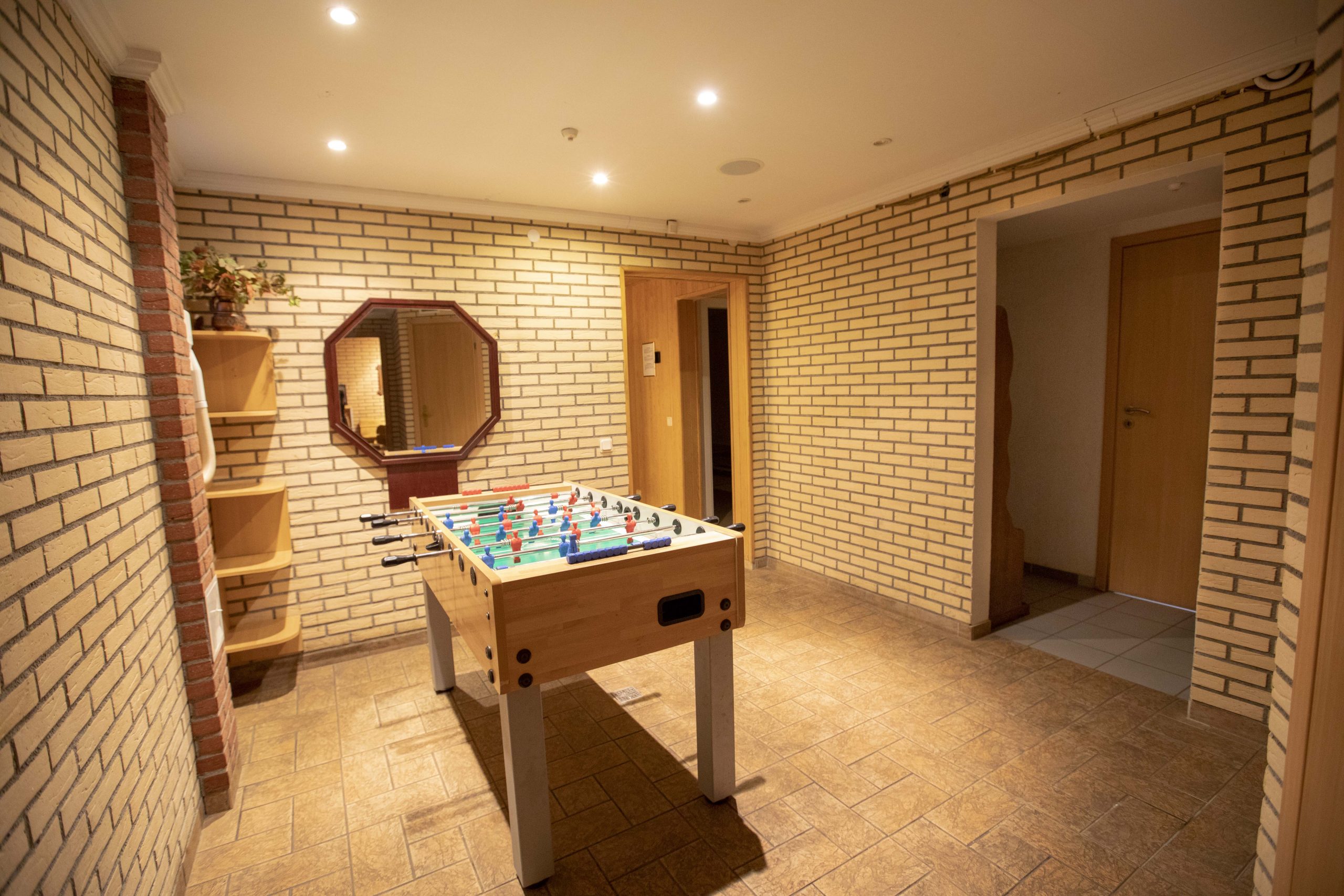 Cozy sauna interior at Amicus Hotel Vilnius, offering relaxation and comfort